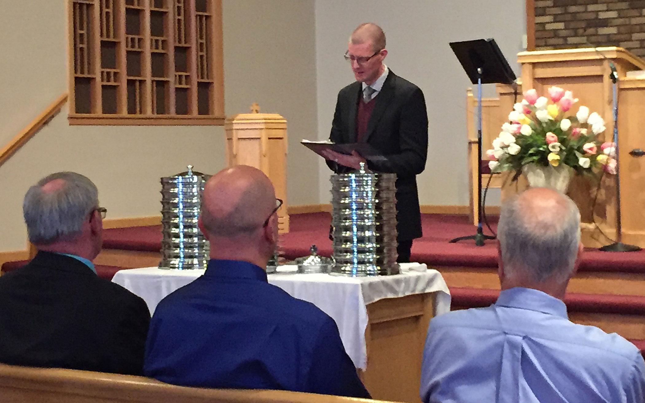 Pastor Scott Muilenberg administered the sacrament of the Lord’s Supper at the commemoration service.