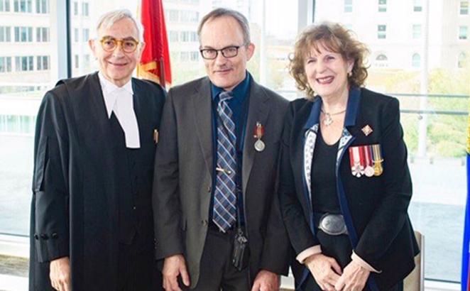 Philip Koning, center, with Legislative Assembly of Alberta Speaker Robert Wanner and Lieutenant Governor of Alberta Lois Mitchell.